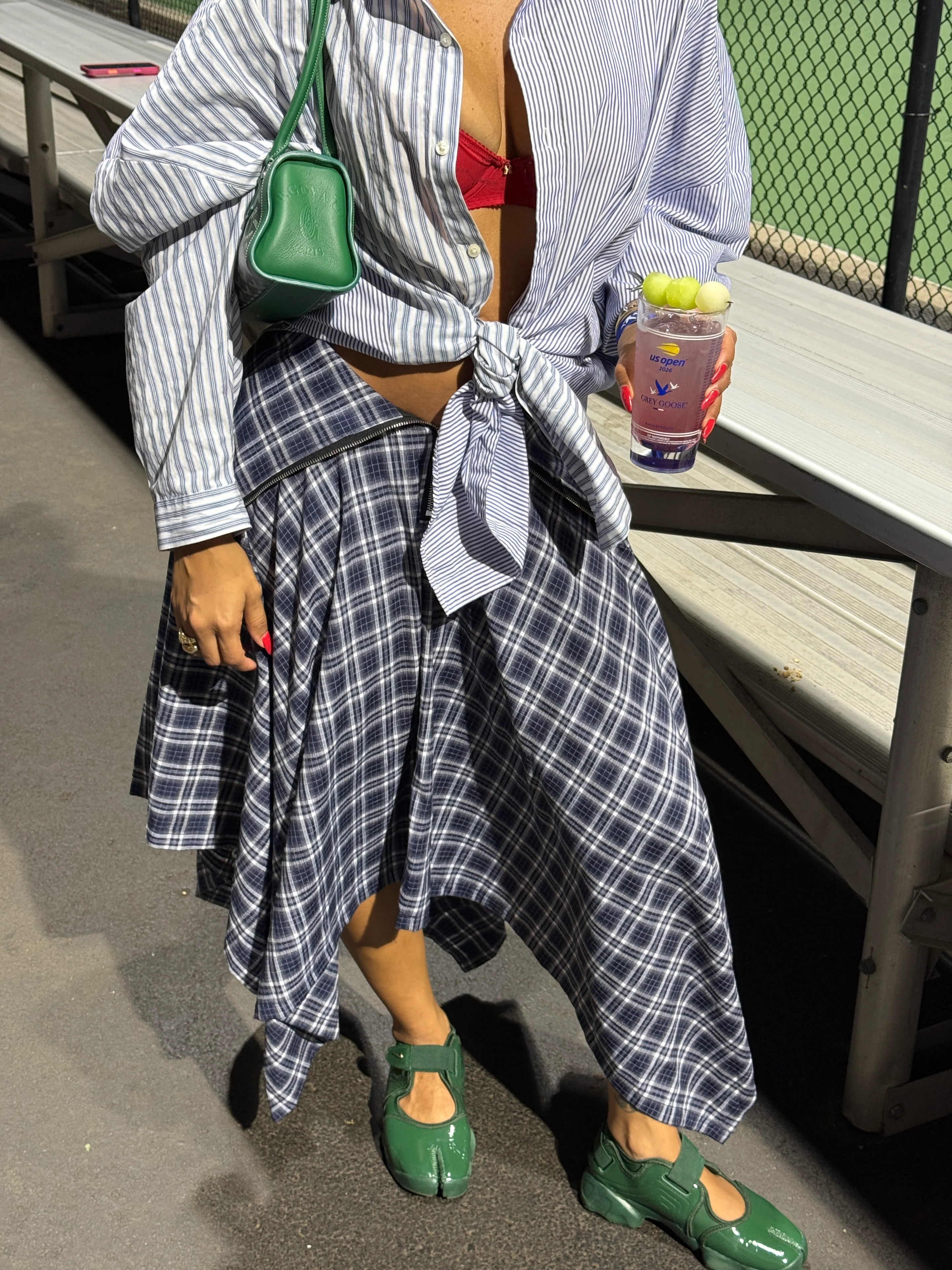 Blue striped button-up over red bra, plaid asymmetrical skirt, green tabi Mary Janes, green bag.